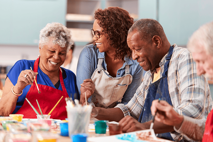 Group Of Retired Seniors Attending Art Class