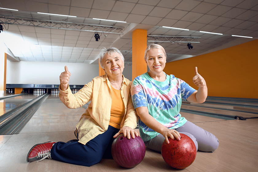 senior women enjoying their time at bowling club